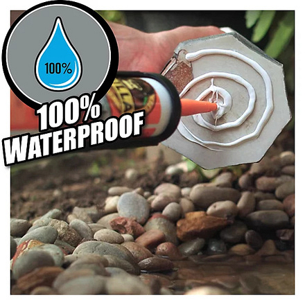 Gorilla Heavy Duty Grab Adhesive being applied in a circular bead to a stone surface, demonstrating its 100% waterproof formula.